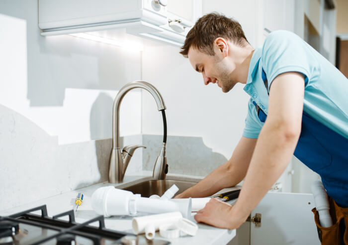 How does a plumber help with professional boiler installation in homes?